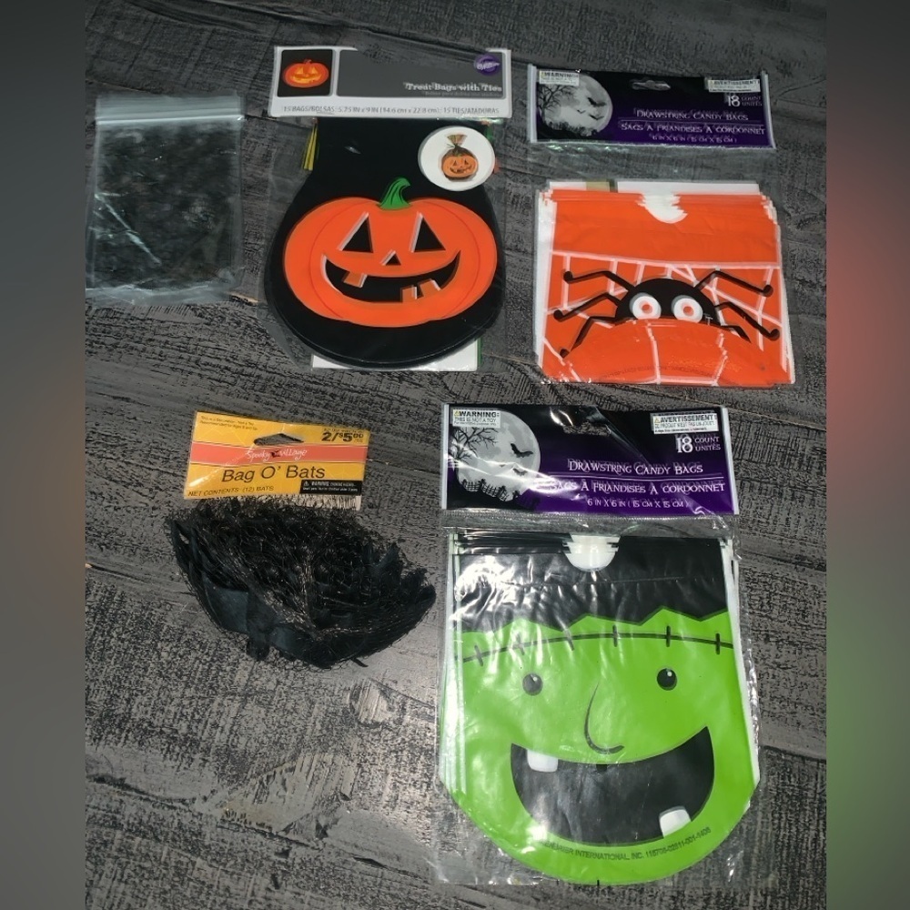 Halloween Goodie Baggies and plastic bats
55 plastic baggies, 12 plastic bats